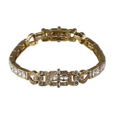 Gold bracelet with crystal accents on a white background