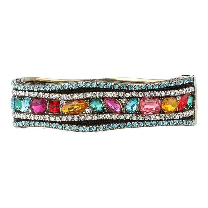 Multicolored gemstone bracelet with clear stones on a white background
