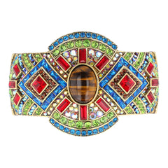 Multicolored gemstone belt buckle on a white background