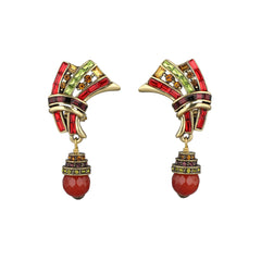 Pair of ornate earrings with red and gold design on a white background