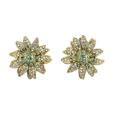 Pair of gold flower-shaped earrings with gemstones on a white background