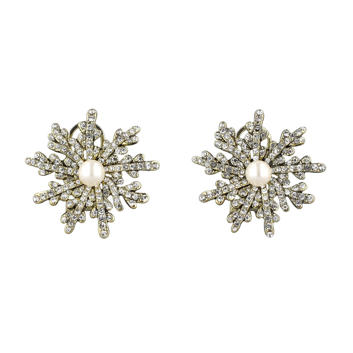 Pair of snowflake-shaped earrings with pearl centers on a white background