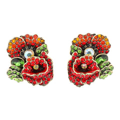 Colorful flower-shaped earrings with gemstones on a white background