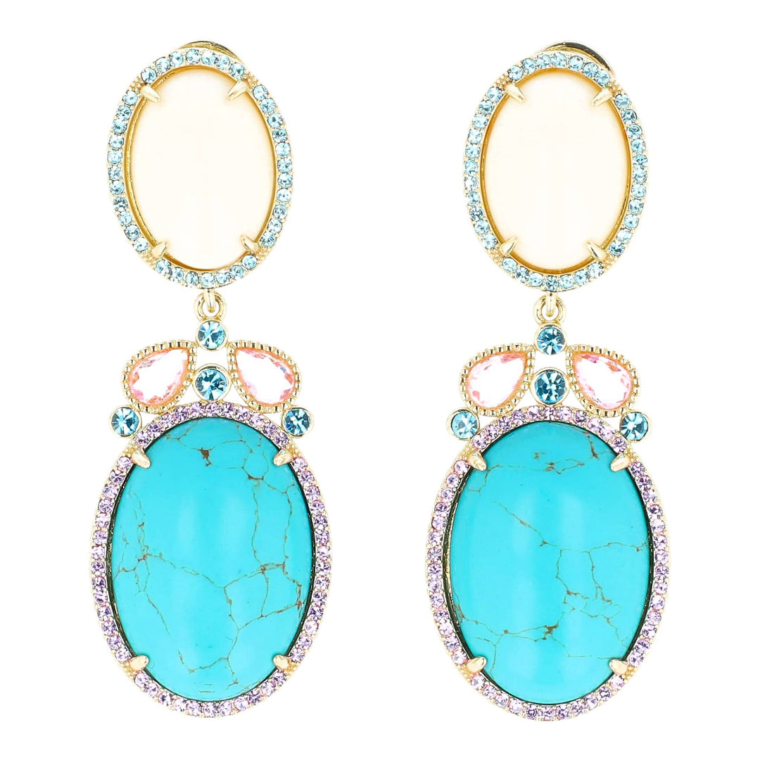 Turquoise earrings with gold and pink accents on a white background