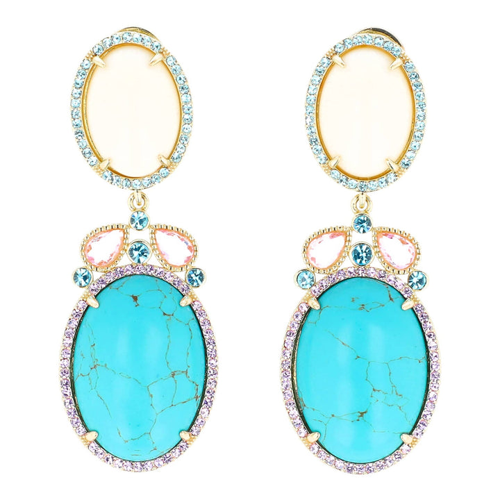 Turquoise earrings with gold and pink accents on a white background