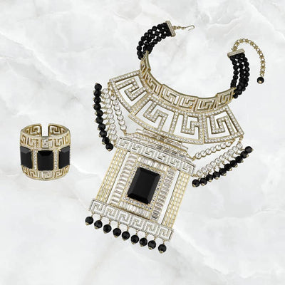 Necklace with black beads and a ring on a white background