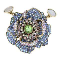 Decorative object with colorful gemstones on a white background
