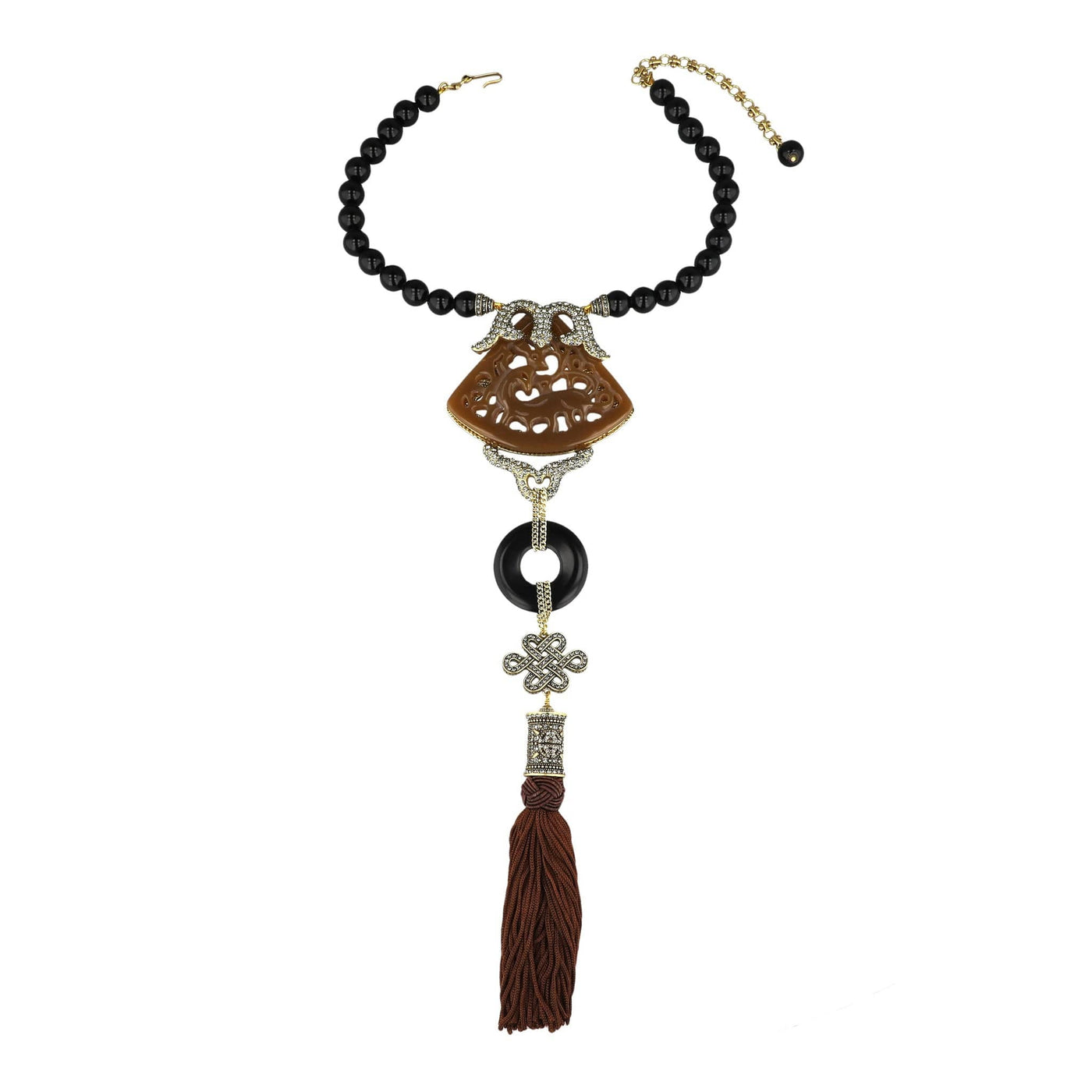 Necklace with black beads, brown tassel, and decorative pendant on a white background