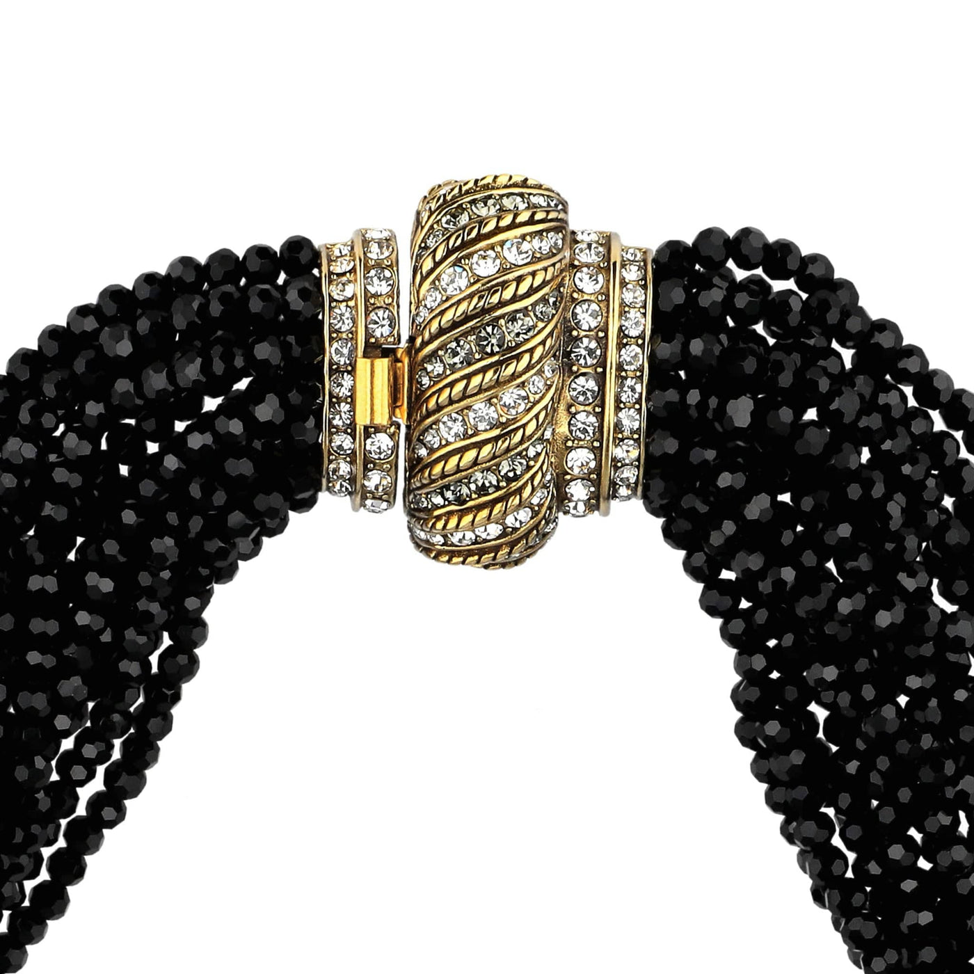Black beaded necklace with a gold and crystal clasp on a white background