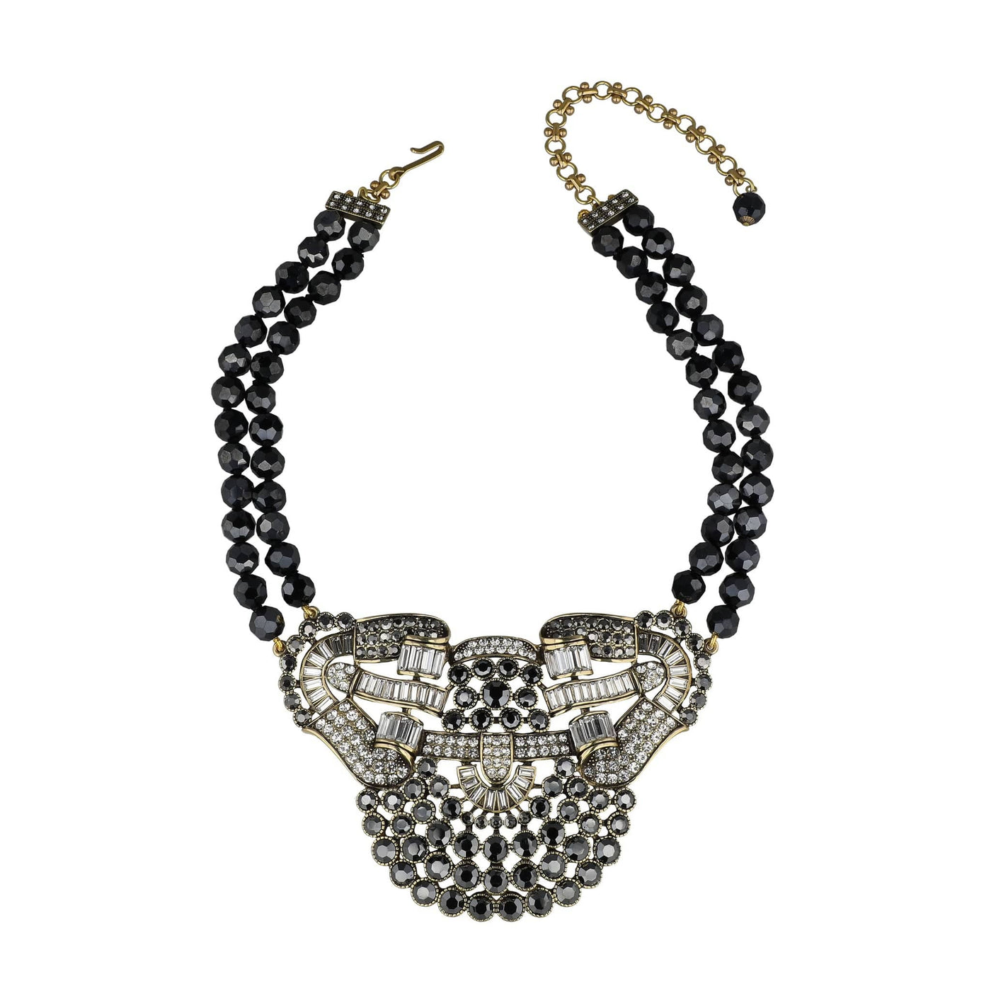 Necklace with black beads and a decorative clasp on a white background