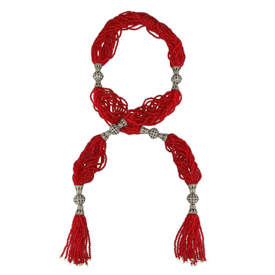 Red beaded necklace with tassels on a white background