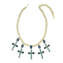 Necklace with gold chain and blue cross pendants on a white background