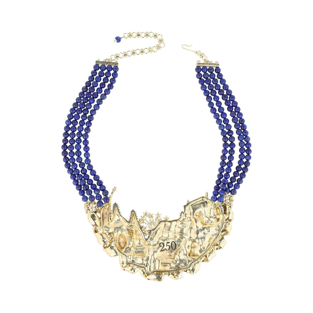 Necklace with blue beads and gold clasp on a white background