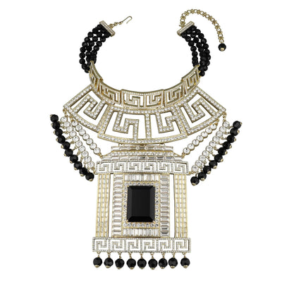 Ornate necklace with black beads and a central black stone on a white background