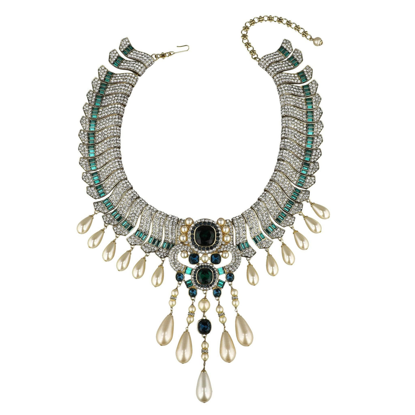 Ornate necklace with green, black, and white stones on a white background