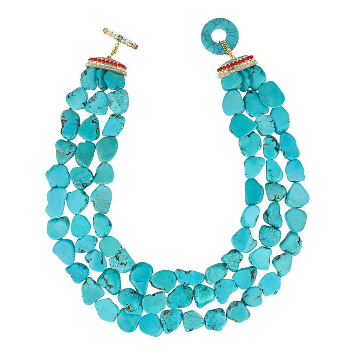 Turquoise necklace with a white background