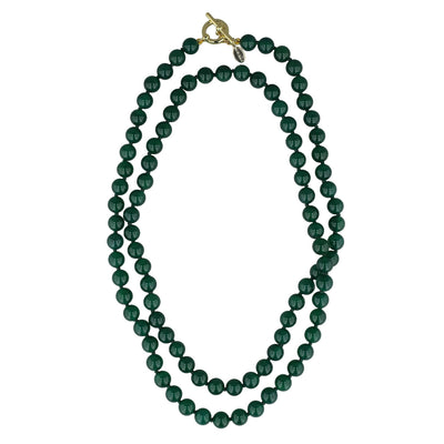 Green beaded necklace with a gold clasp on a white background