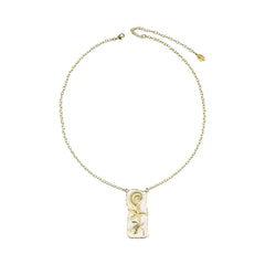 Gold necklace with a pendant on a white background