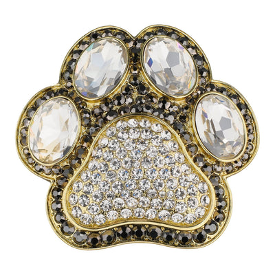 Jeweled paw print accessory with crystals on a white background