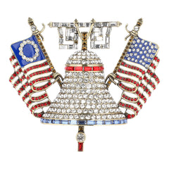 Brooch with Liberty Bell design and American flags on a white background