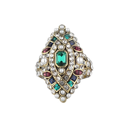 Decorative ring with colorful gemstones and pearls on a white background