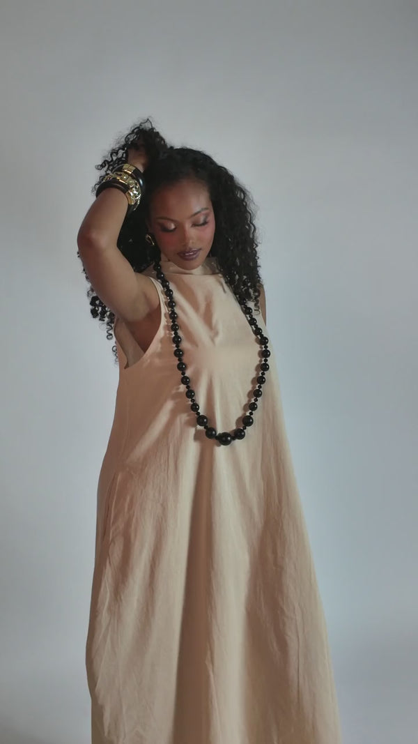 HEIDI DAUS® “Rooted Elegance” 45-Inch Graduated Wood Necklace — Ebony shown on a model; other jewelry shown for styling.