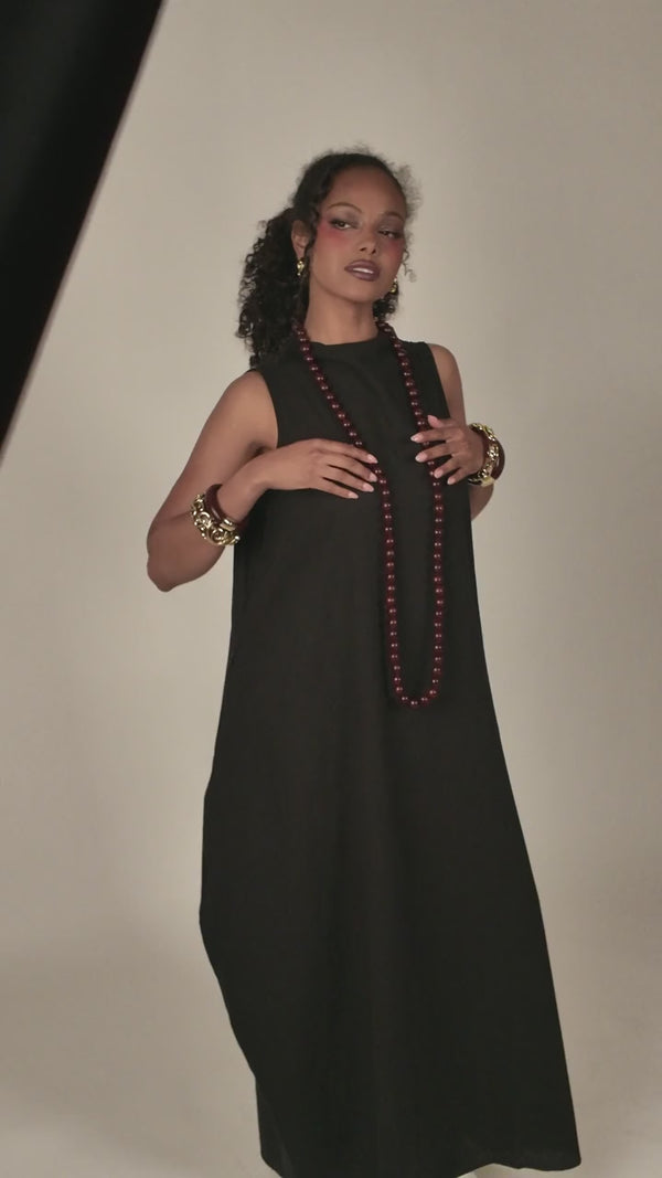 HEIDI DAUS® “Rooted Elegance” 56-Inch Essential Wood Necklace — Mahogany shown on a model; other jewelry shown for styling.